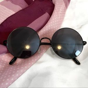 Round black sunglasses